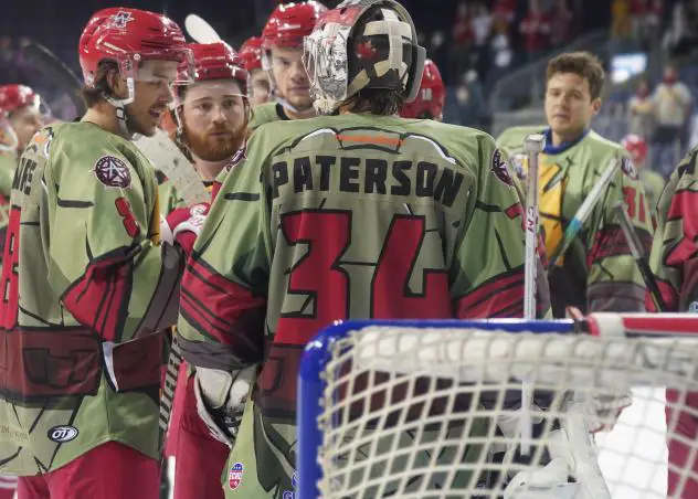 Allen Americans gather around goaltender Jake Paterson