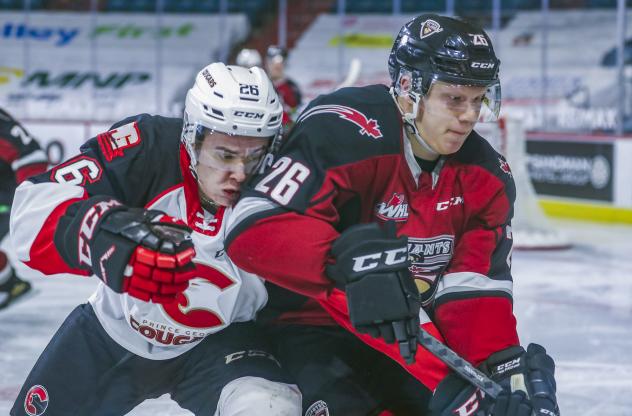 Vancouver Giants right wing Dallon Wilton (right) vs. the Prince George Cougars