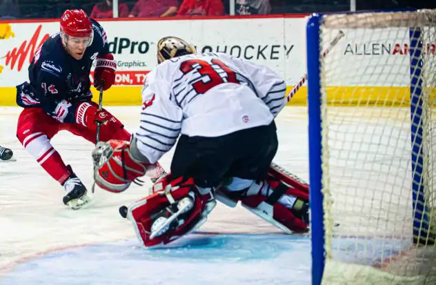 Les Lancaster of the Allen Americans shoots vs. the Rapid City Rush