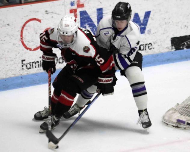 Odessa Jackalopes forward Liam O'Hare (left) vs. the Lone Star Brahmas