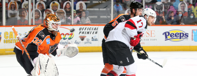 Binghamton Devils left wing A.J. Greer (right) vs. the Lehigh Valley Phantoms