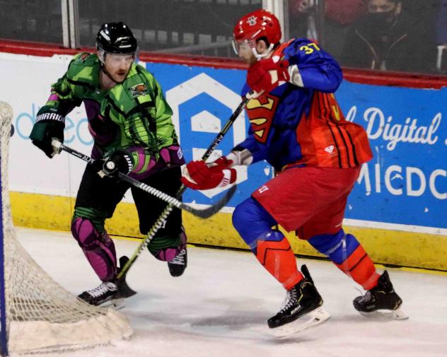 Allen Americans in Superman uniforms (right) battle the Utah Grizzlies