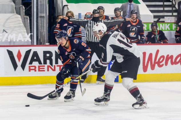 Vancouver Giants centre Adam Hall (right) vs. the Kamloops Blazers