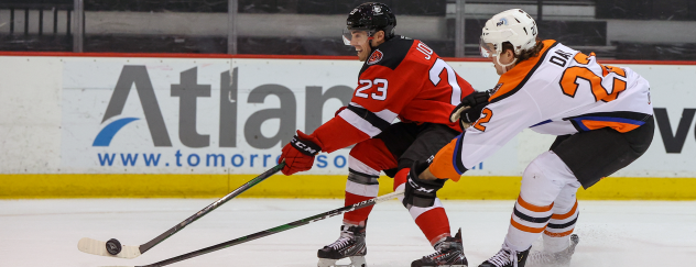 Binghamton Devils center Mason Jobst (left) vs. the Lehigh Valley Phantoms