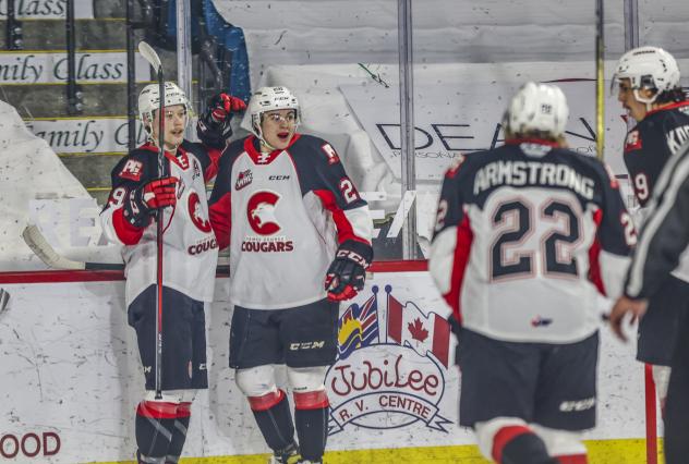 Prince George Cougars celebrate a Craig Armstrong goal vs. the Victoria Royals