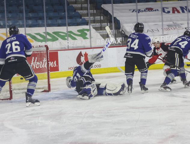 Prince George Cougars centre Kyren Gronick scores vs. the Victoria Royals