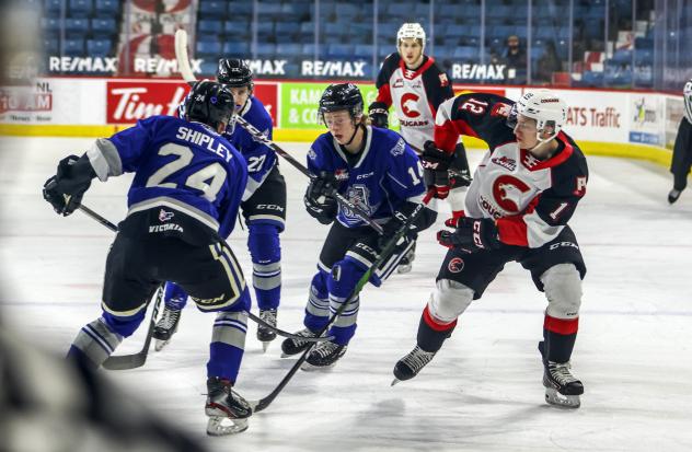 Prince George Cougars left wing Davin Griffen (right) vs. the Victoria Royals