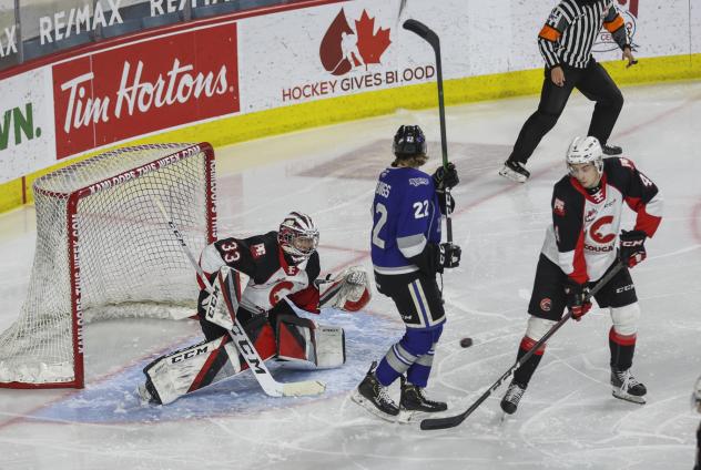 Prince George Cougars defenceman Ethan Samson (right) and goaltender Ty Young vs. the Victoria Royals