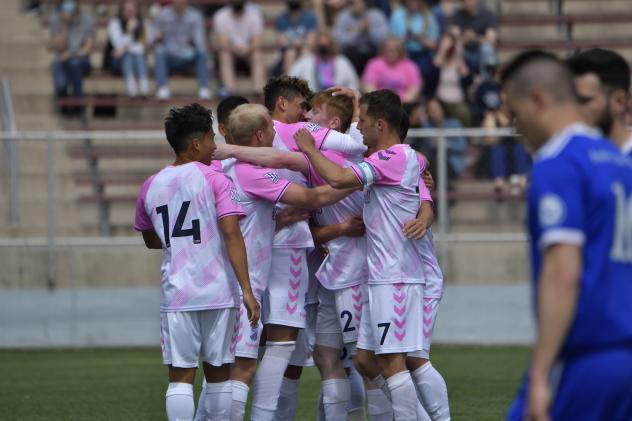 Forward Madison FC celebrates a goal against Milwaukee Bavarians SC