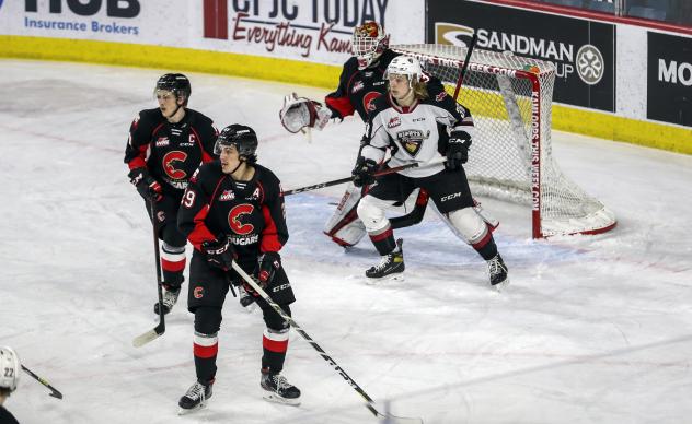 Prince George Cougars goaltender Taylor Gauthier and defenders vs. the Vancouver Giants