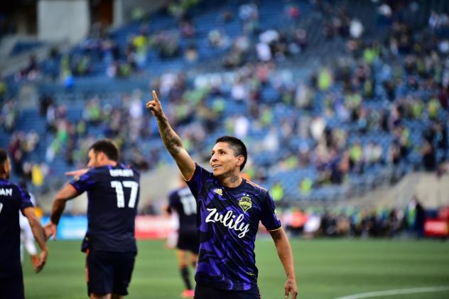 Raul Ruidiaz of Seattle Sounders FC salutes the crowd