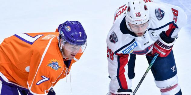 Orlando Solar Bears forward Tyler Bird (left) faces off with the South Carolina Stingrays