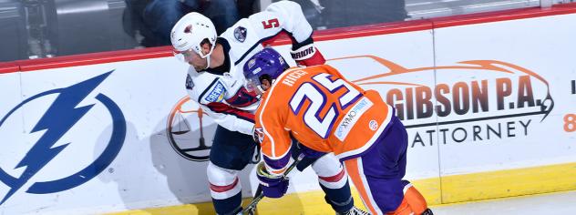 South Carolina Stingrays defenseman Tyler Nanne (back) vs. the Orlando Solar Bears