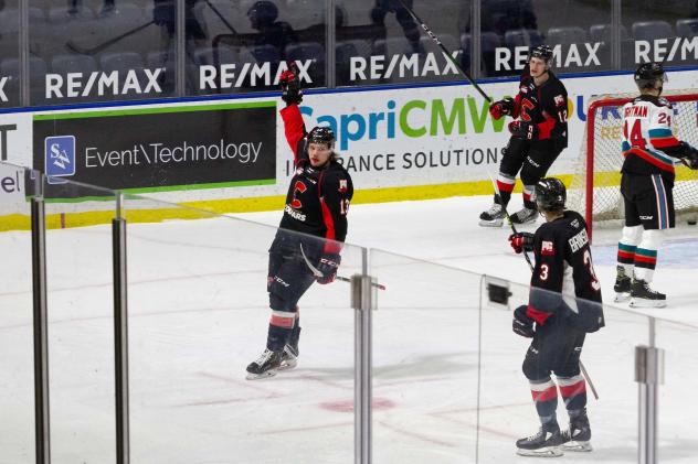 Prince George Cougars centre Koehn Ziemmer reacts after a goal against the Kelowna Rockets