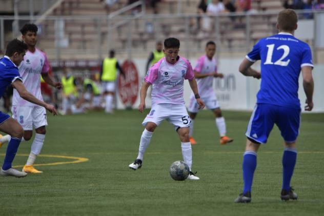 Forward Madison FC defender Ronaldo Lomeli