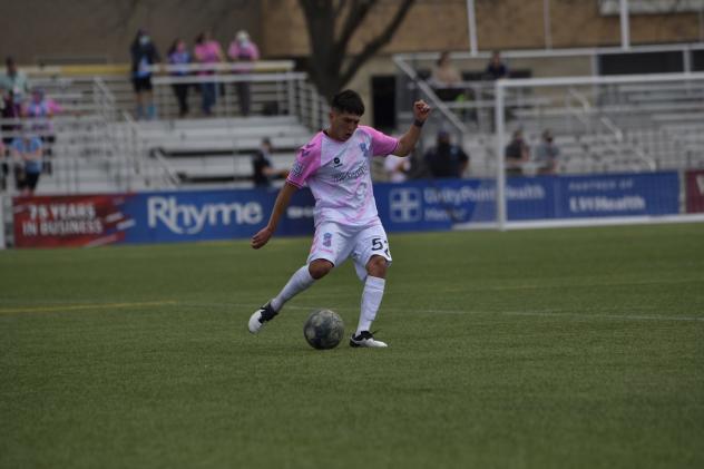 Forward Madison FC defender Ronaldo Lomeli