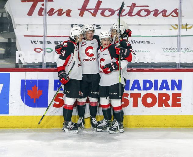 Prince George Cougars congratulate Koehn Ziemmer on his goal vs. the Vancouver Giants