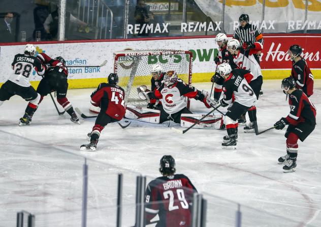 Prince George Cougars defend the goal vs. the Vancouver Giants