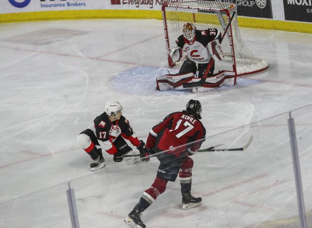 Prince George Cougars goaltender Taylor Gauthier stops the Vancouver Giants