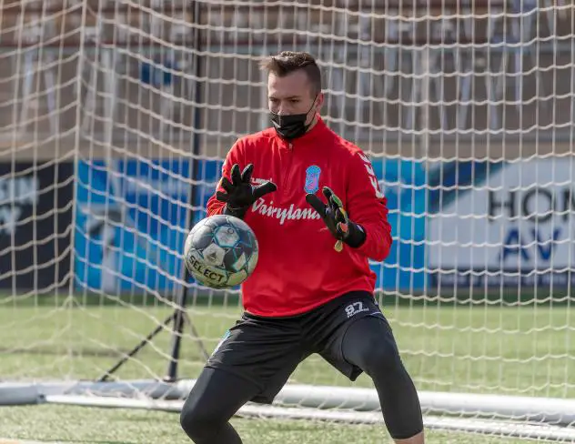 Forward Madison FC goalkeeper Aidan Hogan