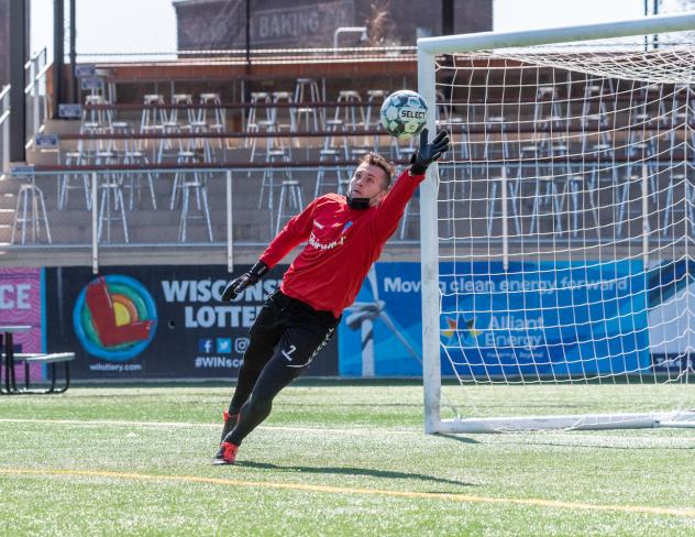 Forward Madison FC goalkeeper Aidan Hogan