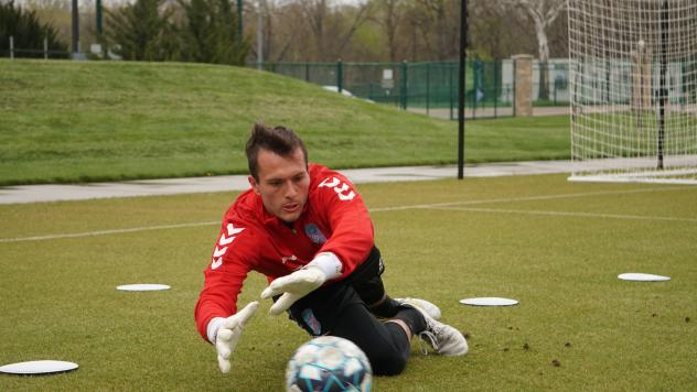 Forward Madison FC goalkeeper Aidan Hogan