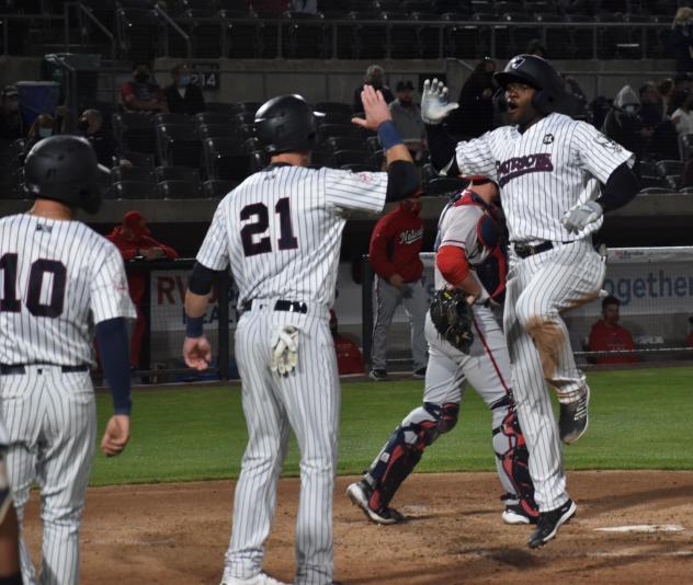 Estevan Florial of the Somerset Patriots jogs past home plate following his homer