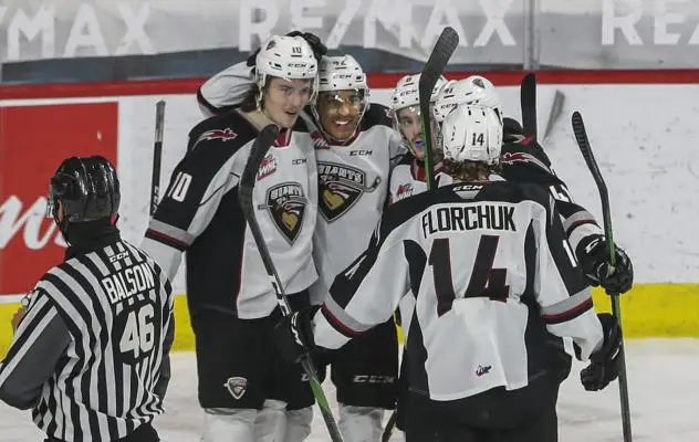 Vancouver Giants celebrate a Justin Sourdif goal against the Kamloops Blazers