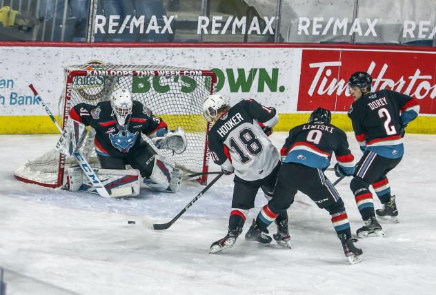 Prince George Cougars left wing Jonny Hooker readies a shot vs. the Kelowna Rockets