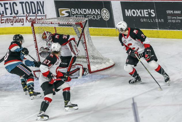 Prince George Cougars goaltender Taylor Gauthier makes a save vs. the Kelowna Rockets