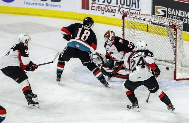 Prince George Cougars goaltender Taylor Gauthier can't stop David Kope's shot for the Kelowna Rockets
