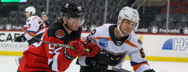 Binghamton Devils right wing Graeme Clarke (left) vs. the Lehigh Valley Phantoms