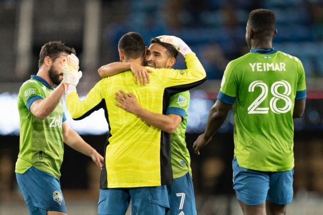 Seattle Sounders FC exchange congratulations against the San Jose Earthquakes