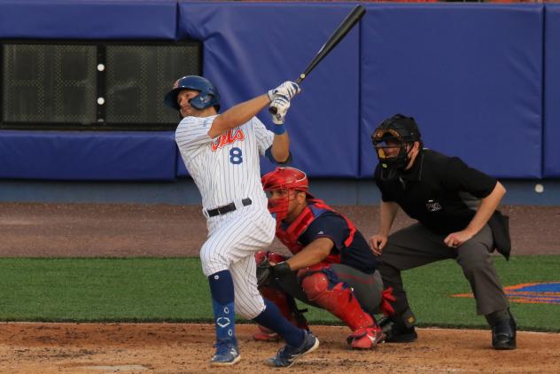 David Thompson of the Syracuse Mets follows through on his home-run swing in the third inning on Thursday night