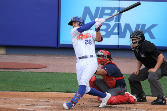 J.D. Davis of the Syracuse Mets with a big swing