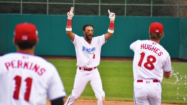Jonathan Guzman reacts after his walk-off hit lifts the Jersey Shore BlueClaws