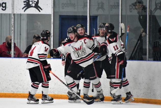 Aberdeen Wings gather after a goal against Minot