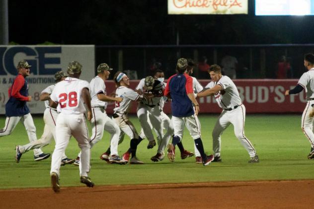 Rome Braves mob Brett Langhorne after his game-winning hit