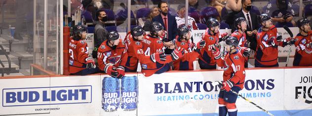 South Carolina Stingrays forward Matthew Weis receives congratulations from the bench