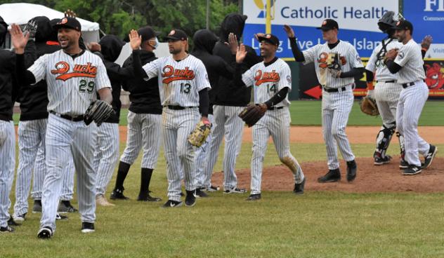Long Island Ducks exchange high fives after a win