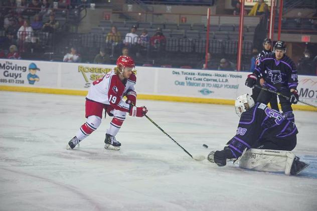 Chad Butcher of the Allen Americans looks to score against the Rapid City Rush