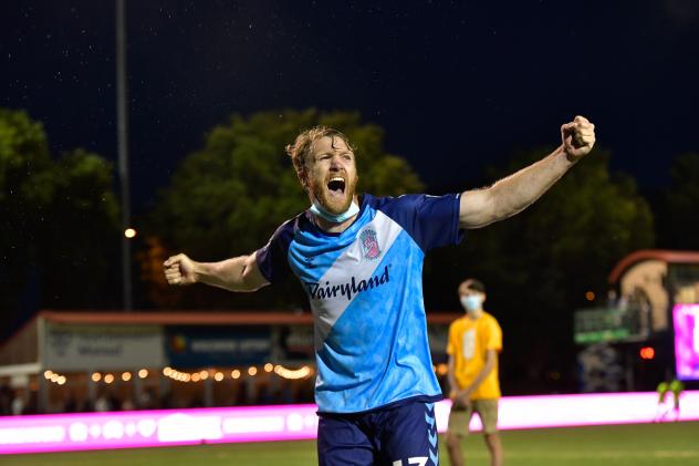 Forward Madison FC defender Connor Tobin