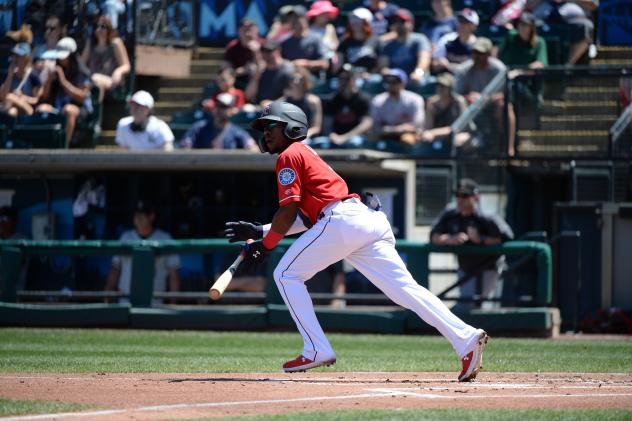 Shed Long of the Tacoma Rainiers breaks from the box