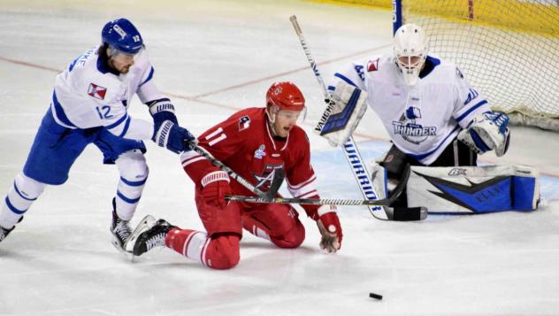 Wichita Thunder goaltender Evan Weninger keeps an eye on the puck against the Allen Americans