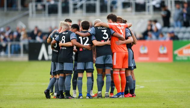 Louisville City FC huddle