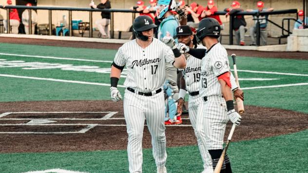 Milwaukee Milkmen catcher Christ Conley (left) and infielder Anibal Sierra