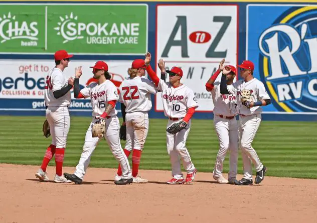 Spokane Indians exchange high fives