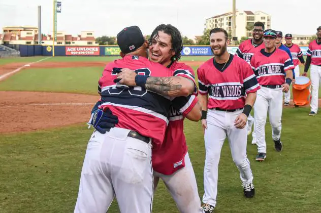 J.D. Osborne of the Pensacola Blue Wahoos is congratulated after a walk-off win