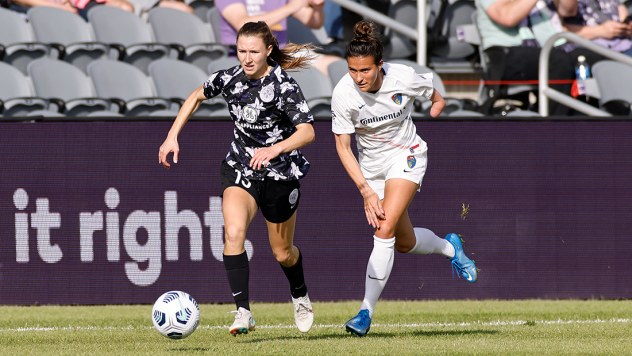 Racing Louisville FC forward Emina Ekic (left) vs. the North Carolina Courage