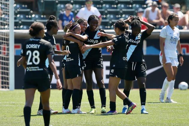 NJ/NY Gotham FC celebrate a goal against OL Reign